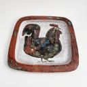 A pair of rectangular ceramic plates with a bird, signed._7