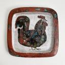 A pair of rectangular ceramic plates with a bird, signed._5